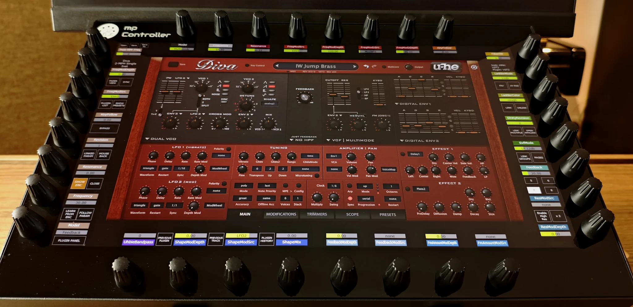 u-he Diva running on the MP Controller's 15.6-inch touchscreen, surrounded by 32 endless encoders auto-mapped to Diva's parameters