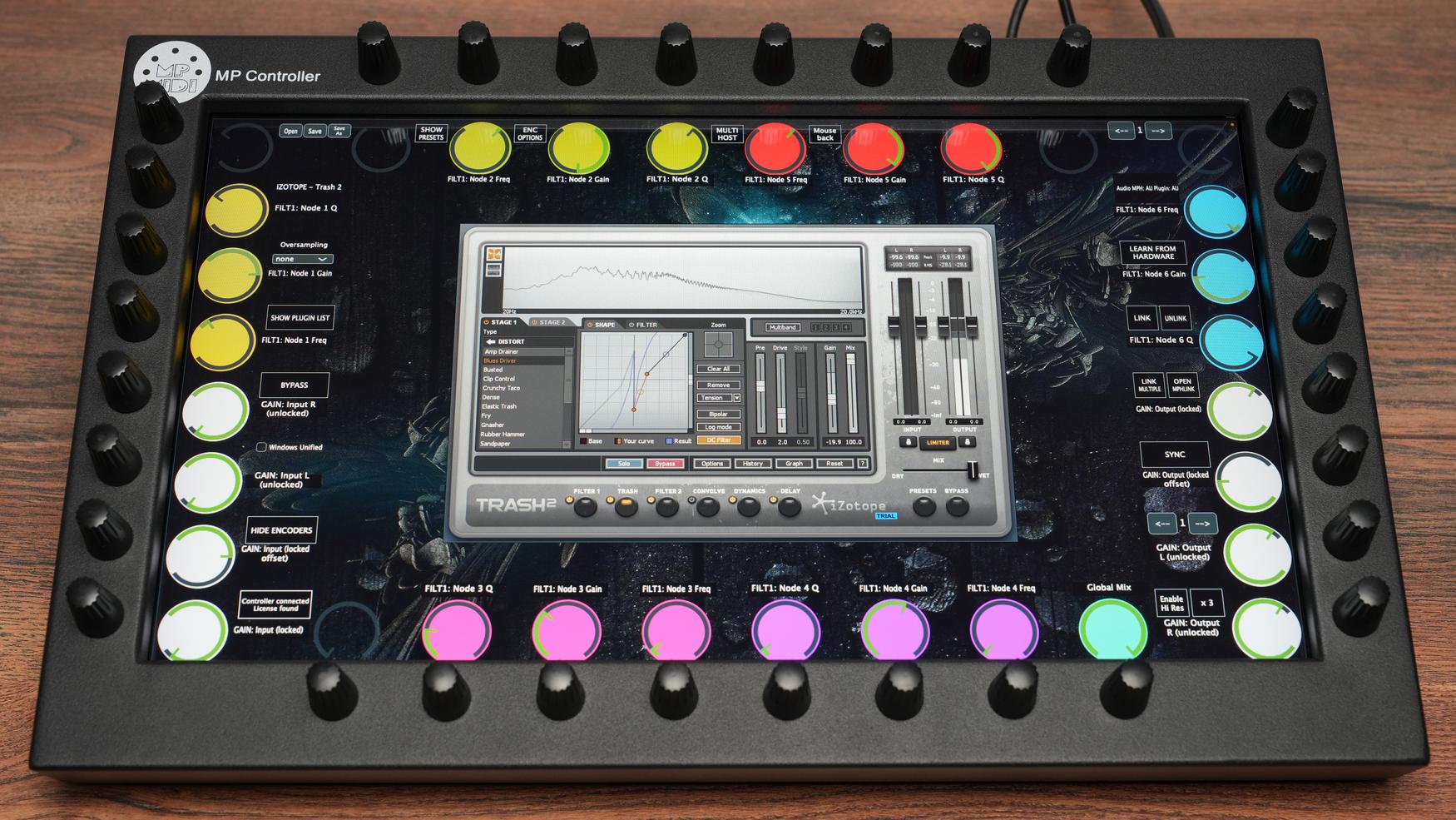 MP MIDI Controller with touchscreen interface showing Izotope plugin controls and 32 endless encoders