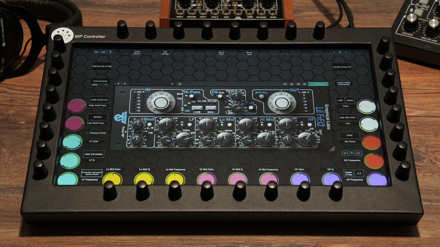 MP MIDI Controller with Softube plugins showing touchscreen interface and 32 high-quality encoders